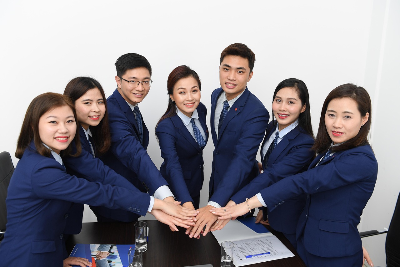 Team, business, asians — Dr. Chad Faaborg Driving Success Through Strategic Practice Management