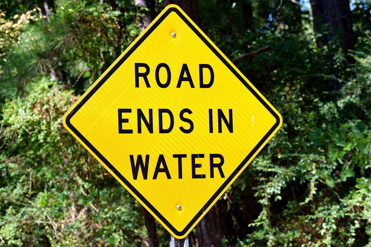 Road sign, warning, caution — Routine Fire Alarm Maintenance for Long-Term Protection